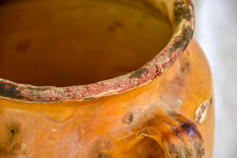Rustic 19th Century French confit pot with orange glaze 10¾"
