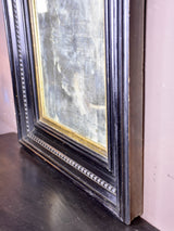19th century Italian mirror with wide carved frame