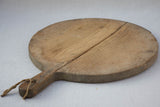 Early 20th century round cutting board branded Girard F. 20½" x 15¼"