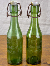 17 antique French lemonade bottles with ceramic stoppers
