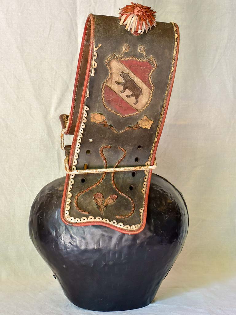 Antique Swisse cowbell with leather strap