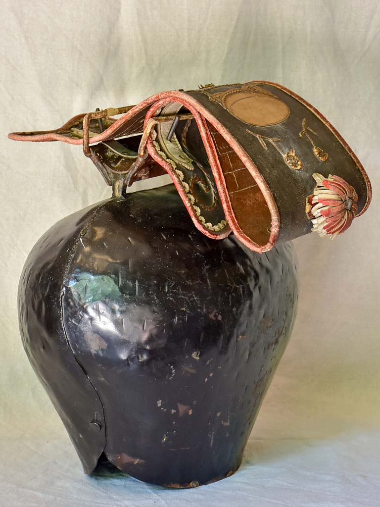 Large antique Swiss cowbell with leather strap
