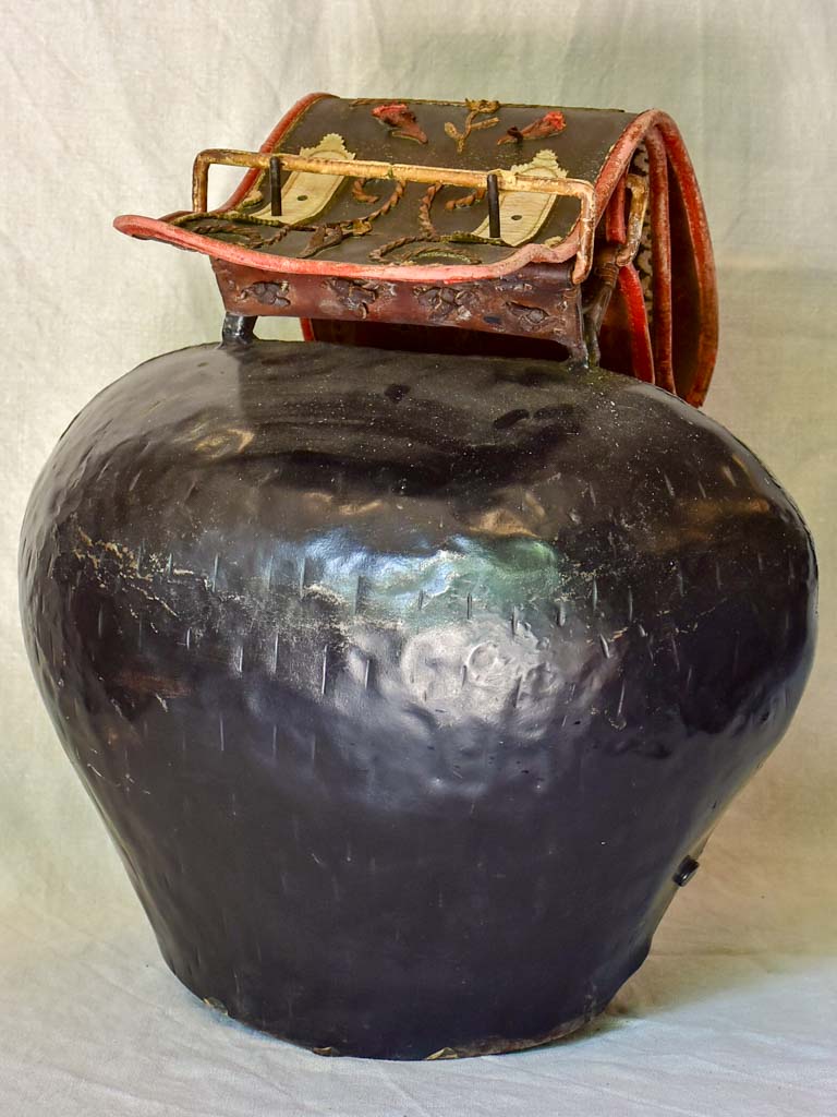 Large antique Swiss cowbell with leather strap