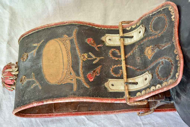 Large antique Swiss cowbell with leather strap