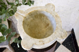 Marble mortar with double headed pestle in carved timber stand