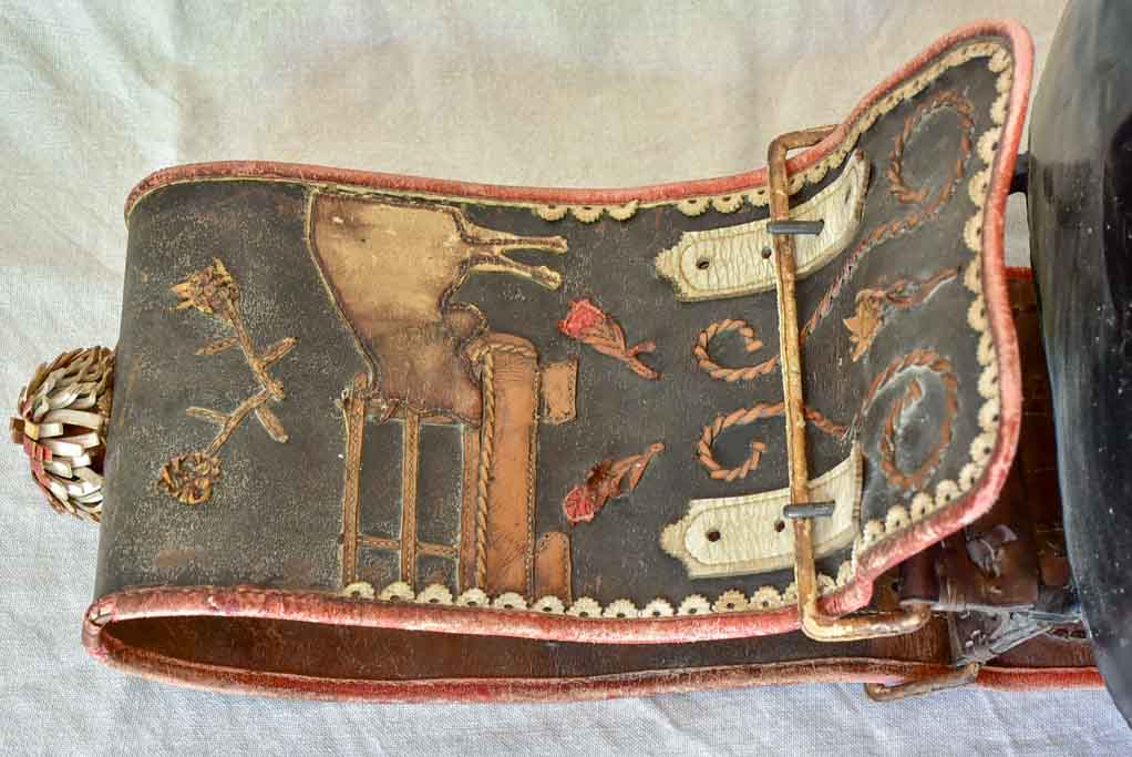 Large antique Swiss cowbell with leather strap