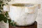 Marble mortar with double headed pestle in carved timber stand
