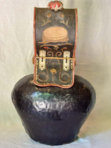 Large antique Swiss cowbell with leather strap