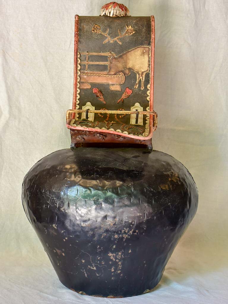 Large antique Swiss cowbell with leather strap