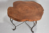Mid-century brutalist tree trunk coffee table on wrought iron base 17"
