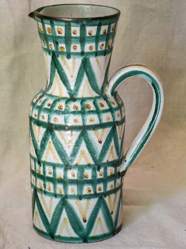 Eight mid century French ceramic Robert Picault juice cups and pitcher