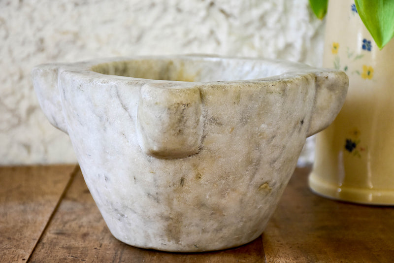 Small marble mortar with double headed pestle