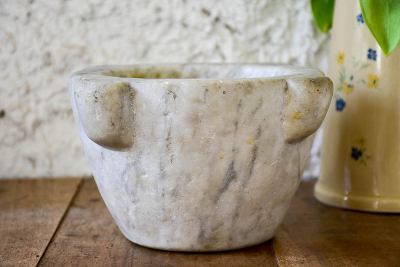 Small marble mortar with double headed pestle