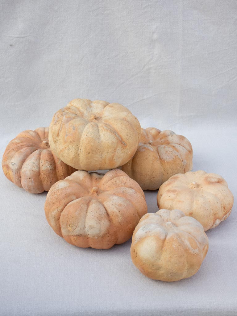 Collection of six terracotta pumpkin decorations