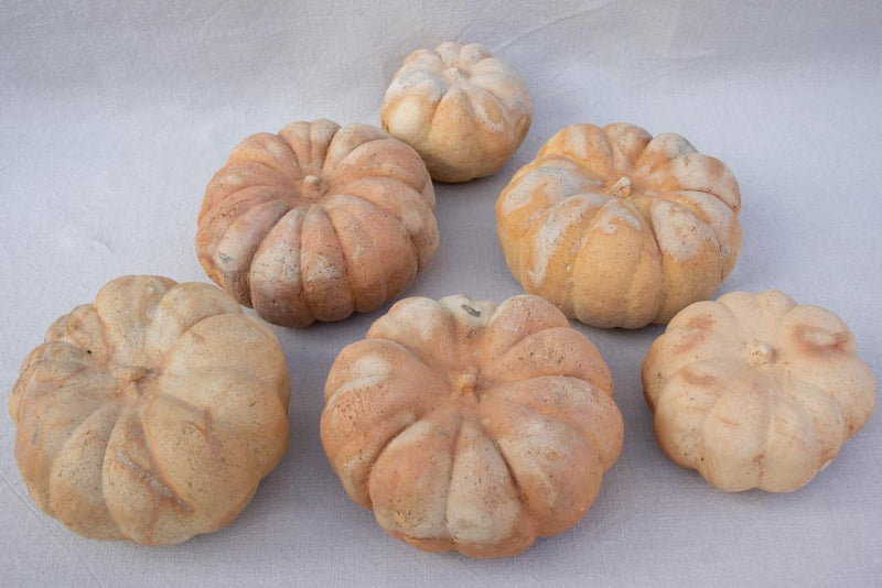 Collection of six terracotta pumpkin decorations