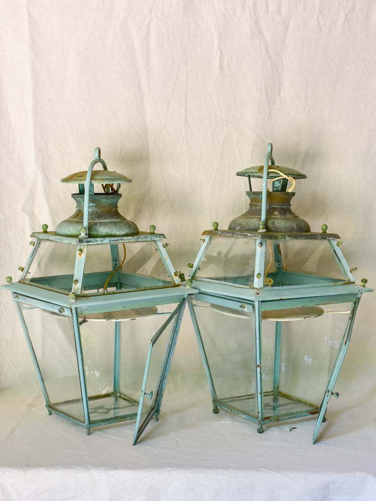 Pair of large 19th Century French lanterns with original glass and blue patina