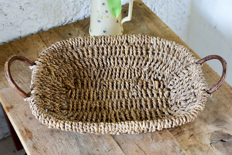 Woven French basket tray with cane handles