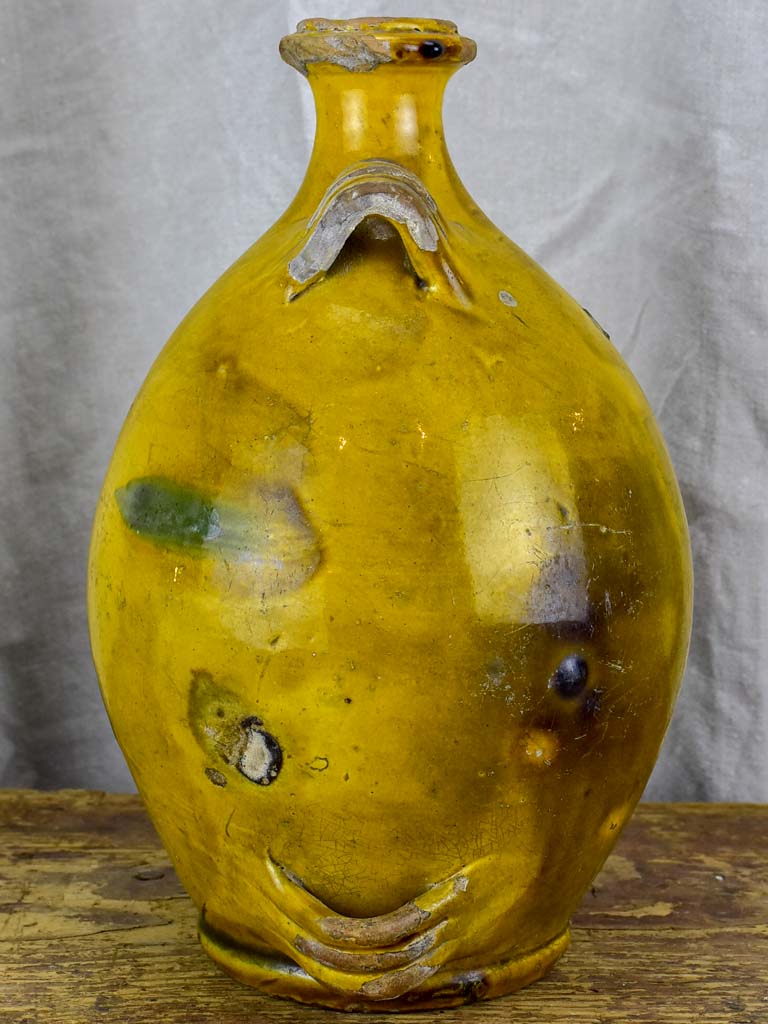 Antique French Provincial Conscience jug with yellow and green glaze - water / oil