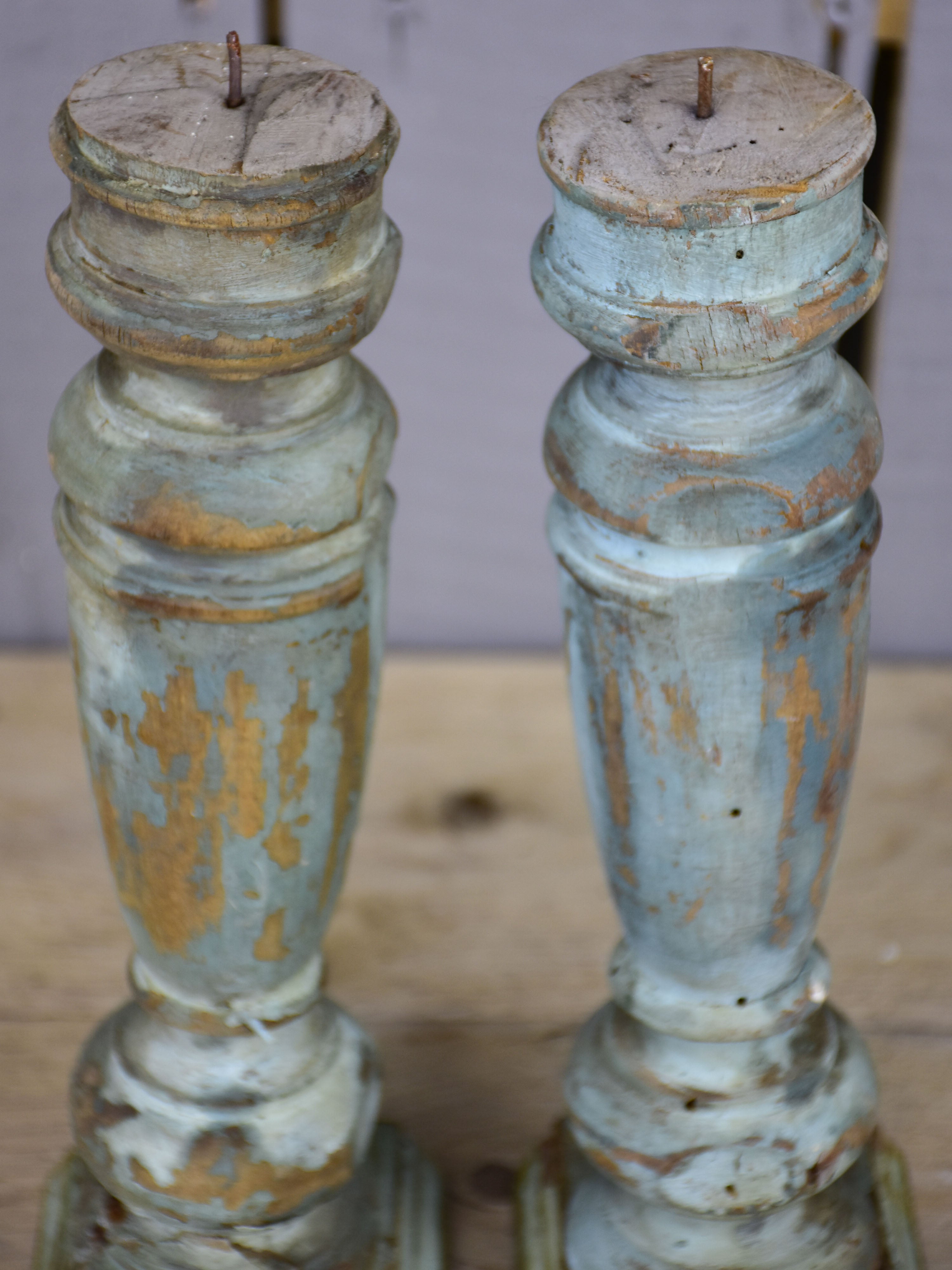 Pair of artisan-made French candlesticks with salvaged materials