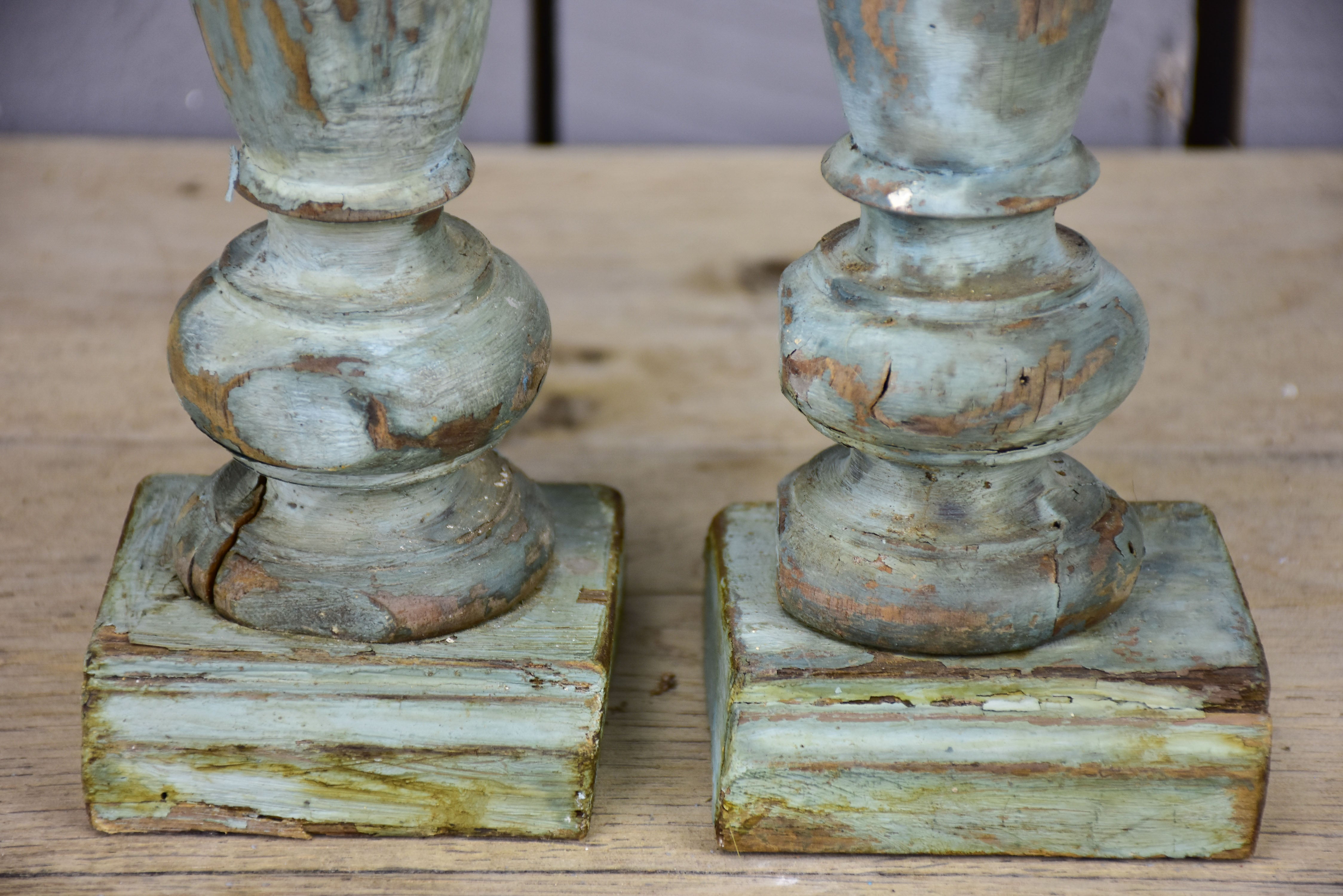 Pair of artisan-made French candlesticks with salvaged materials
