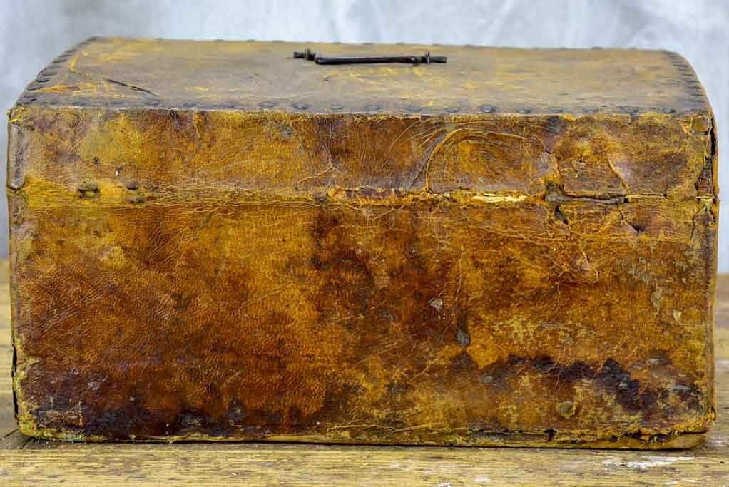 17th Century leather and wooden storage chest with key