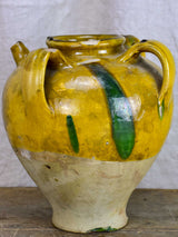 Antique French water jug with yellow and green glaze