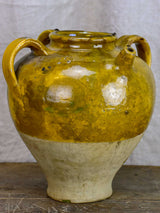 Antique French water jug with yellow and green glaze
