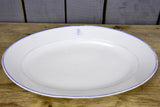Two faïence platters with PL monogram