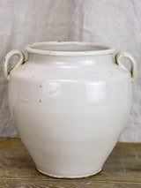 Antique earthenware preserving pot with white glaze