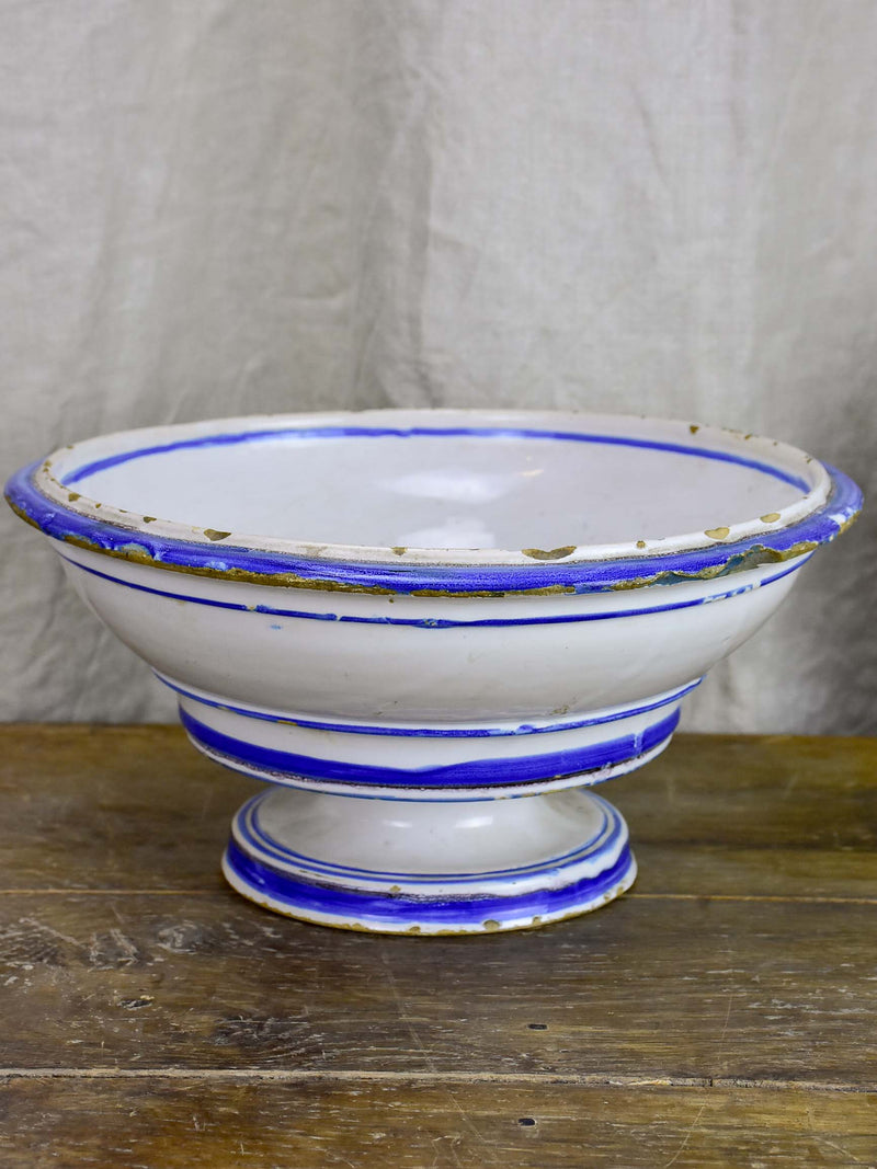 Antique fruit bowl with blue and white glaze