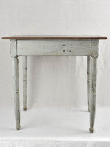 Antique side table with blue-gray patina