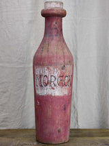 Oversize wooden Morgan bottle sculpture from Beaujolais
