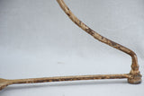 Early 20th century French garden table with ochre patina