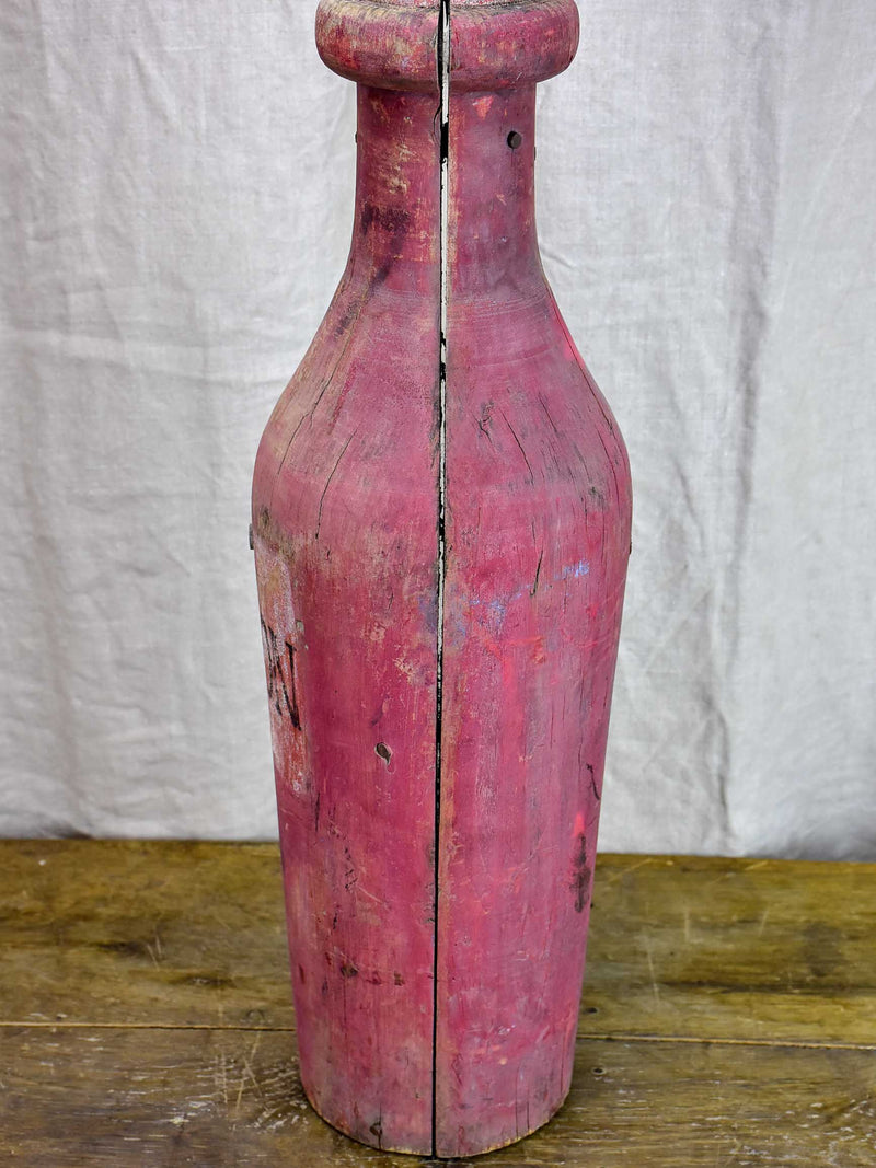 Oversize wooden Morgan bottle sculpture from Beaujolais