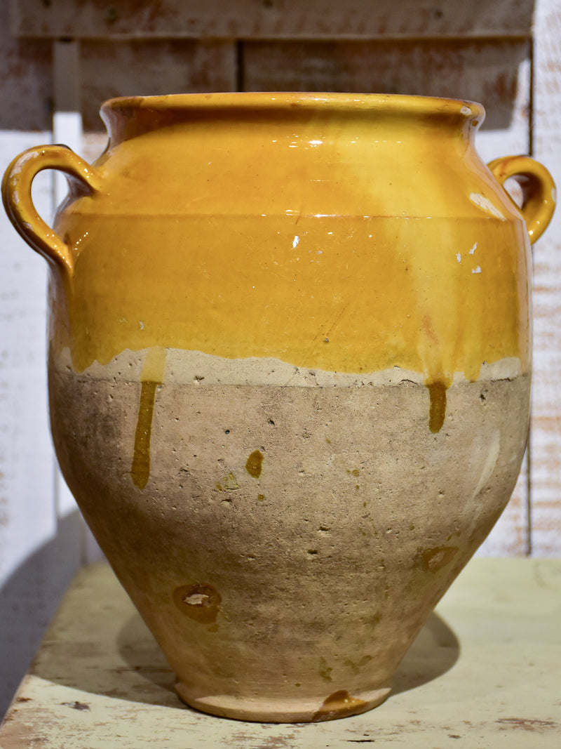 Antique French confit pot with orange glaze