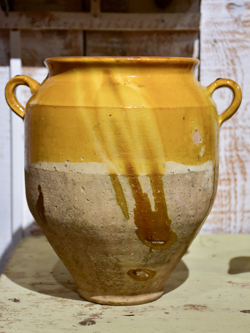 Antique French confit pot with orange glaze
