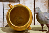Antique French confit pot with orange glaze