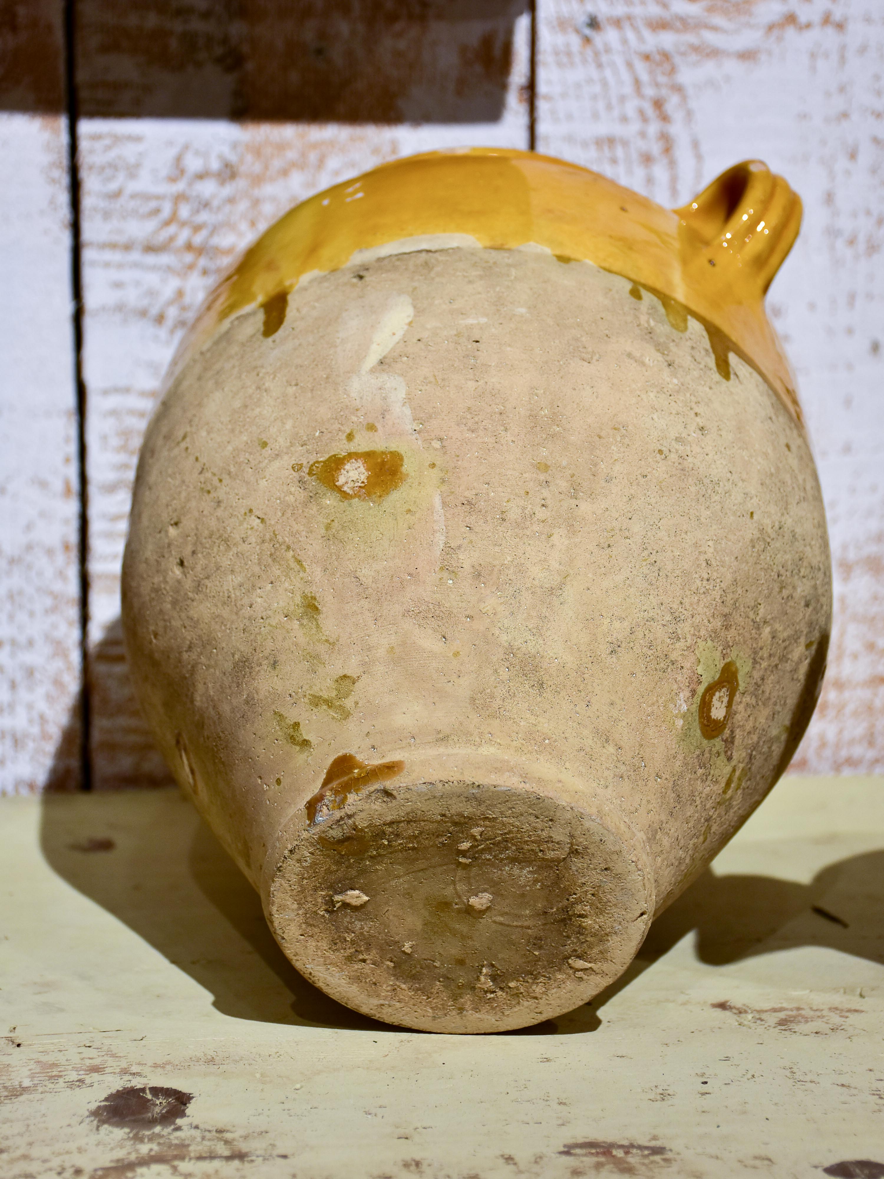 Antique French confit pot with orange glaze