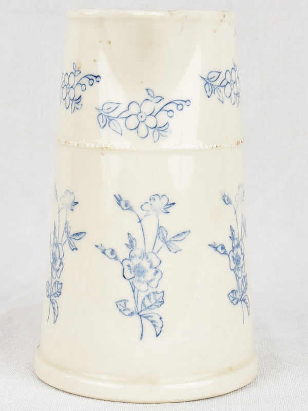 La Saint Uzienne antique ironstone pitcher with blue flowers