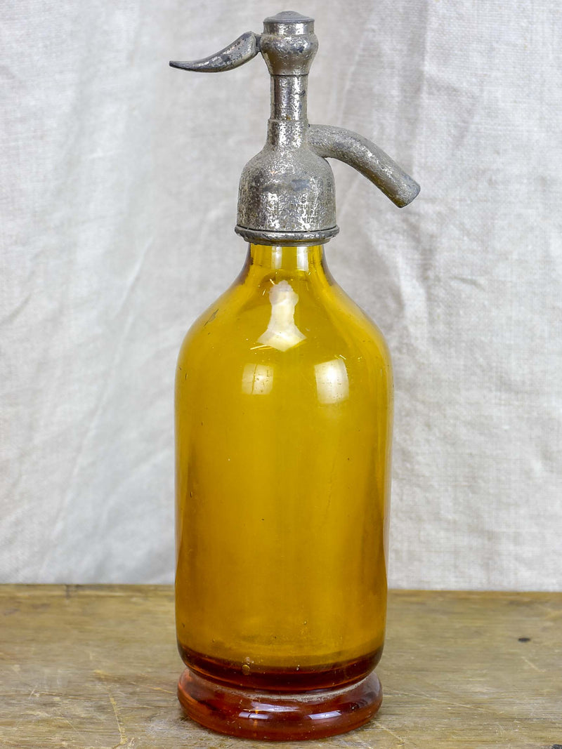 Antique French half-size Seltzer bottle - yellow / amber