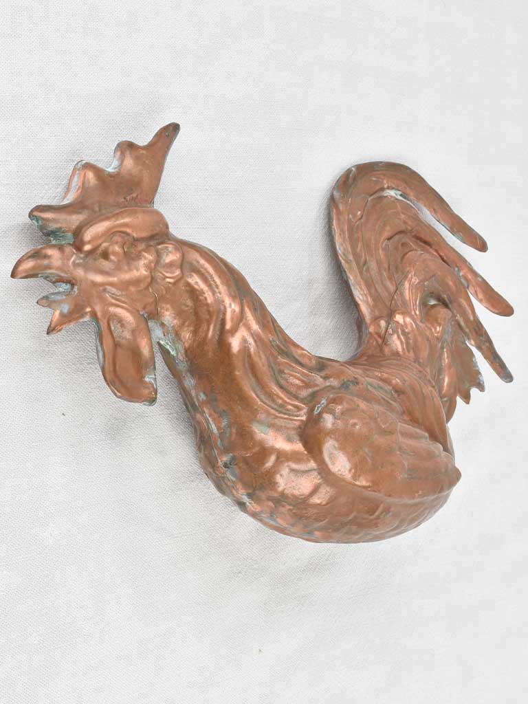 Delicate hand-crafted copper rooster artifact