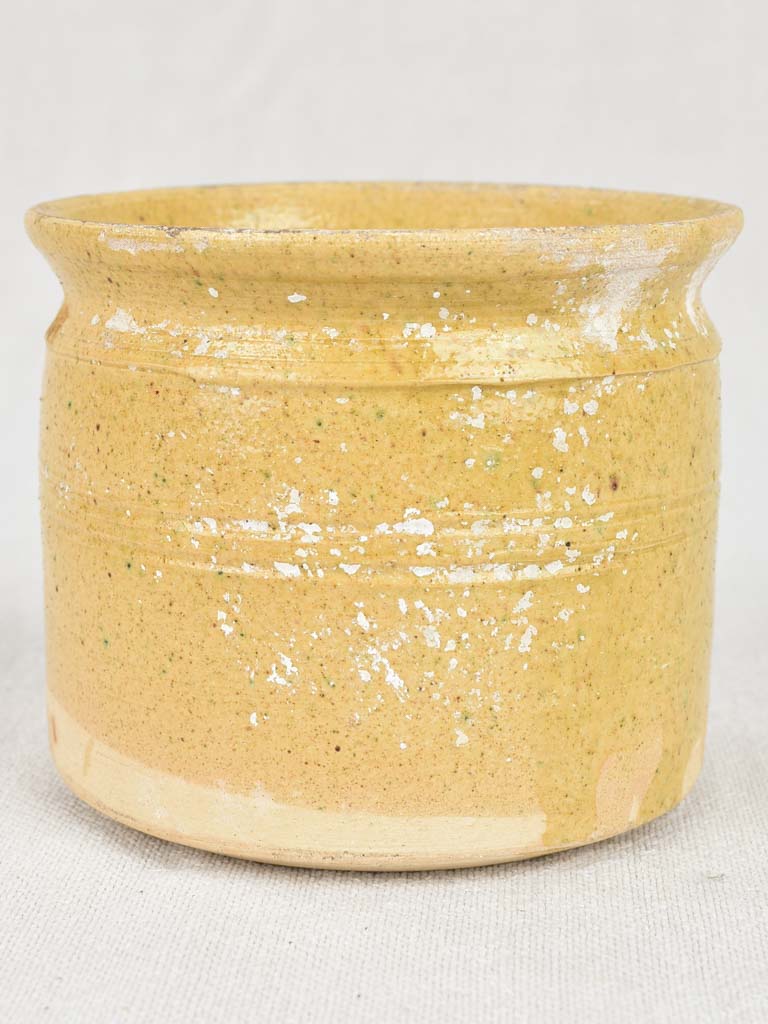 Vintage sandstone pot with gritty texture