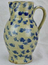 Rustic French pitcher with blue spots