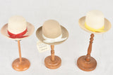 Vintage felt hats with wooden stands