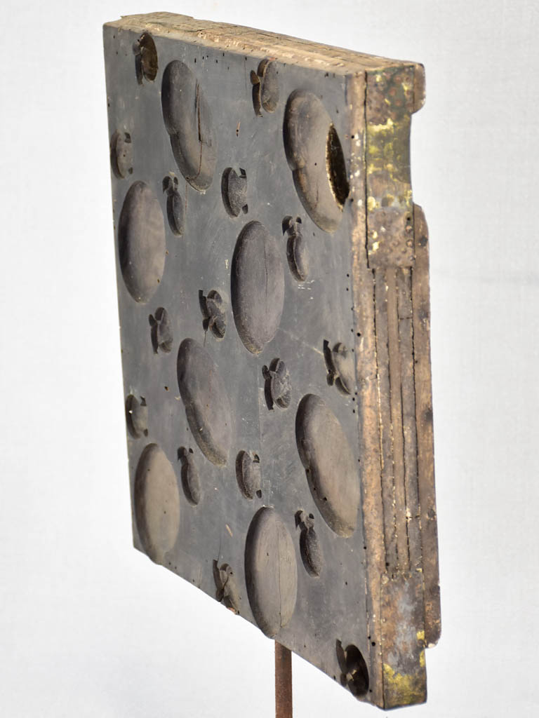 Sculptural 19th-century silk press stamp