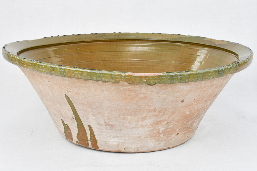 Very large tian terracotta bowl with olive green glaze 33½"