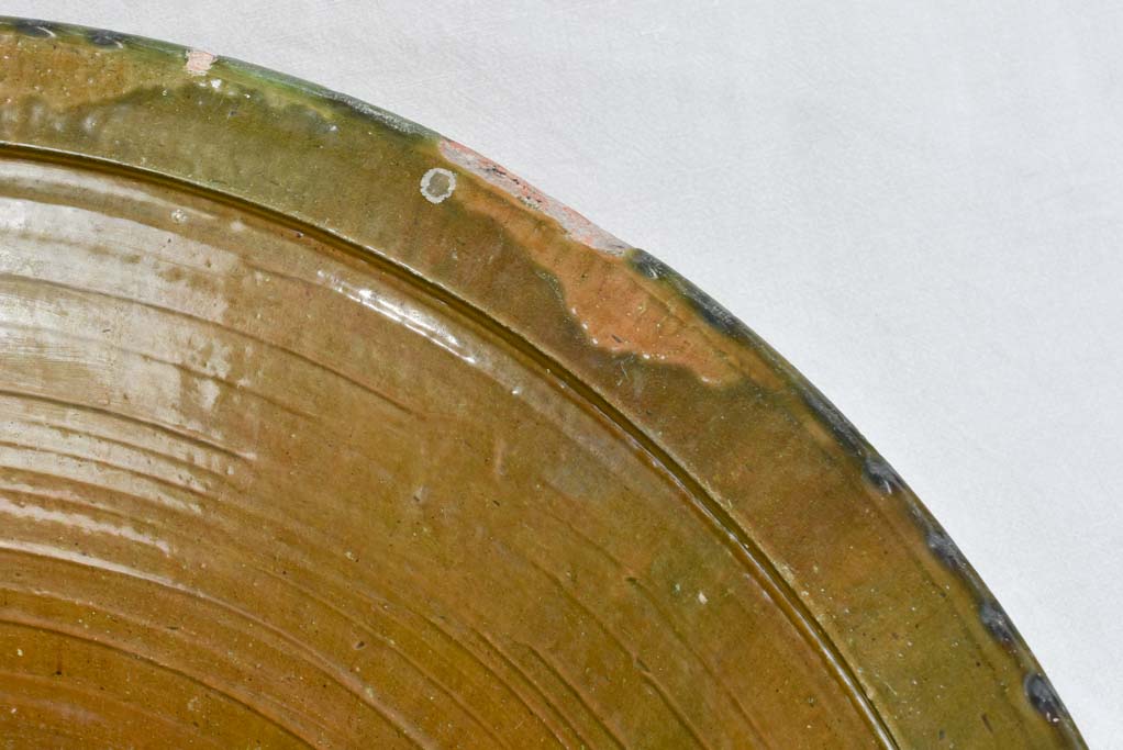 Very large tian terracotta bowl with olive green glaze 33½"