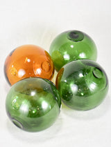 Collection of four vintage glass fishing floats 5"