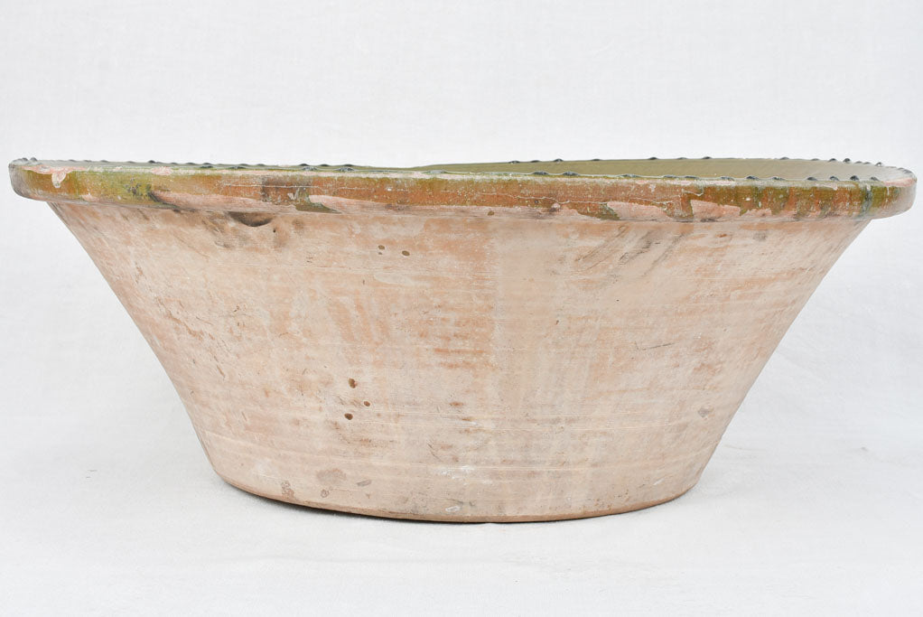 Very large tian terracotta bowl with olive green glaze 33½"