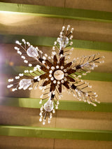 Gold palm frond chandelier with crystals